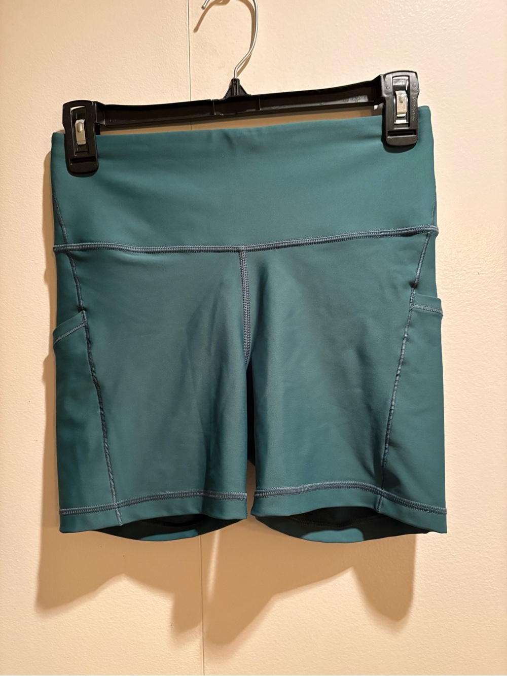 Athleta Emerald Green Stretch High-Rise Athletic Shorts with Pockets.